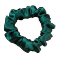 Green satin scrunchie on a transparent background