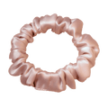 Pink satin hair scrunchie on a transparent background